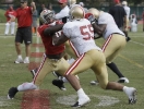 San Francisco 49ers tight end Vernon Davis, left, practices with linebacker Ahmad Brooks